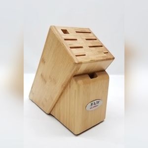 You are looking at a Global Takashi 9 Slot Cutlery Wooden Knife Block.
